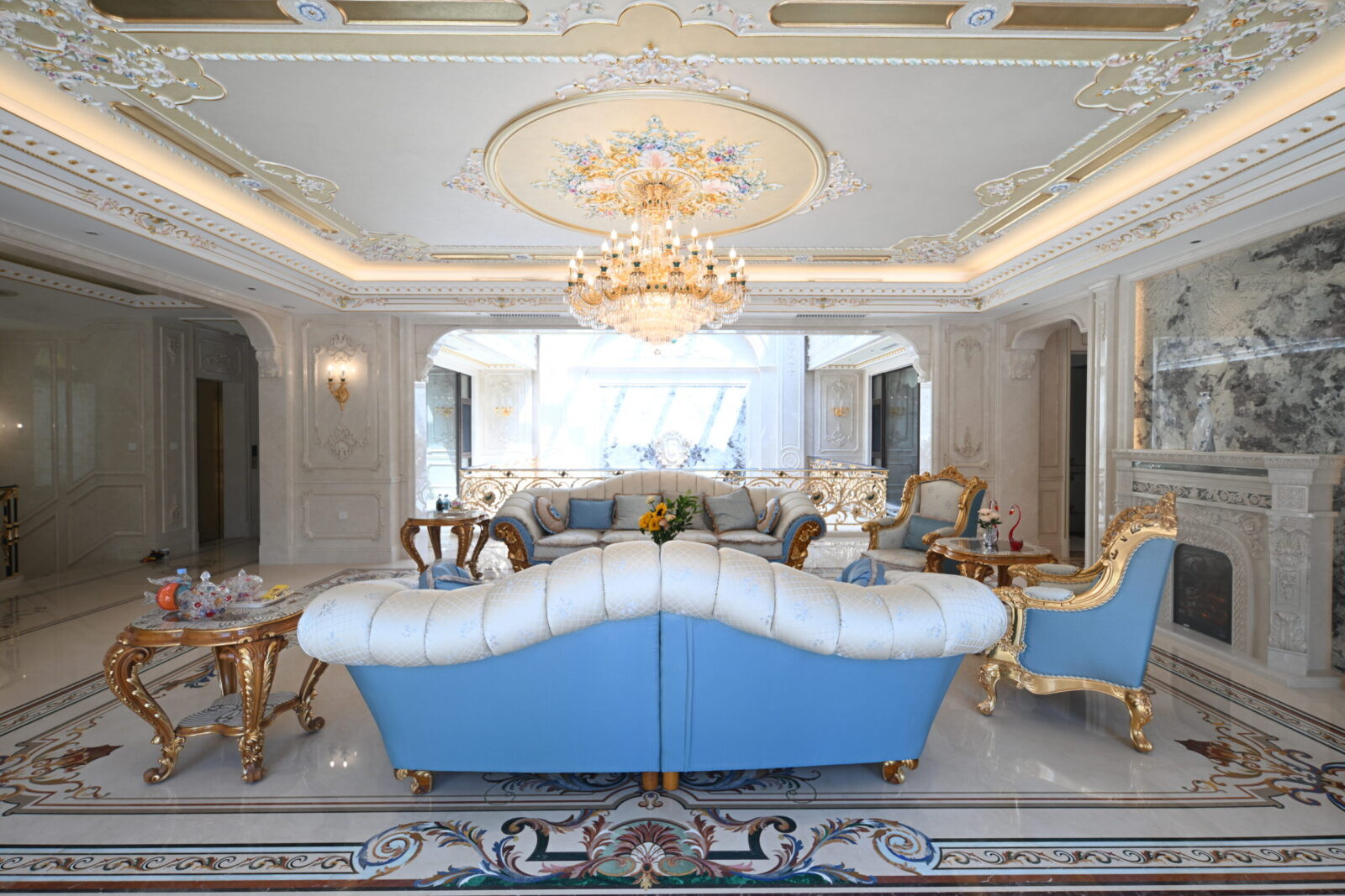 Beijing luxury interior featuring custom marble inlay flooring, a stunning marble floor medallion, and exquisite stone craftsmanship.