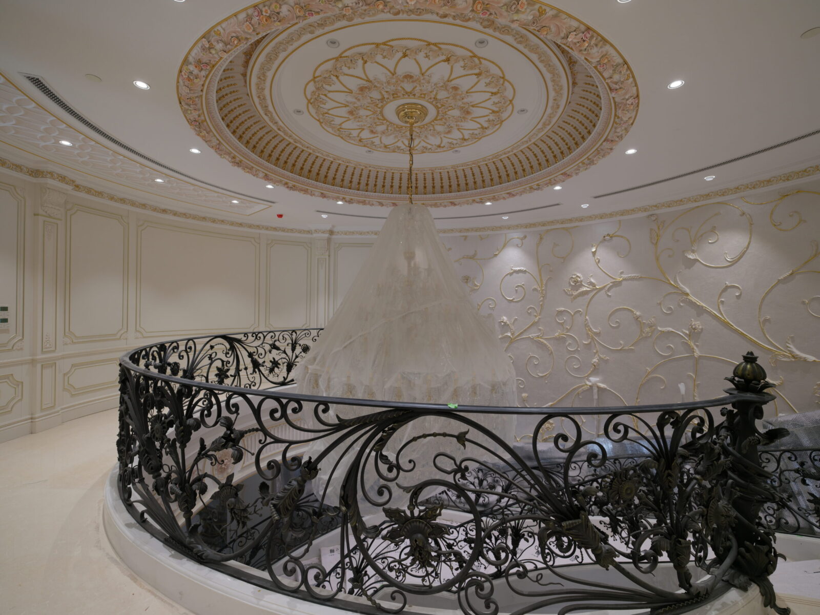 Sustainable reclaimed marble medallion in luxury foyer.
