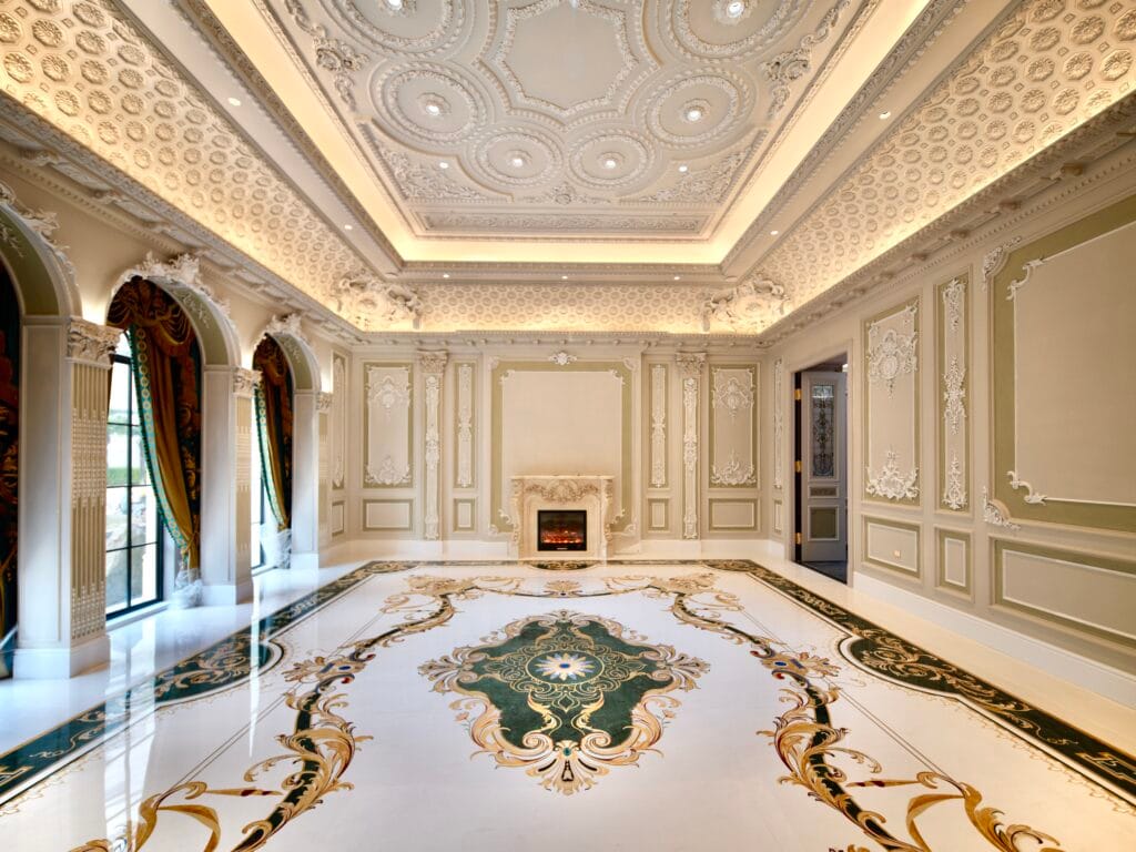 Luxury marble flooring with a custom marble inlay. Features a beautiful marble floor medallion design and stone craftsmanship.