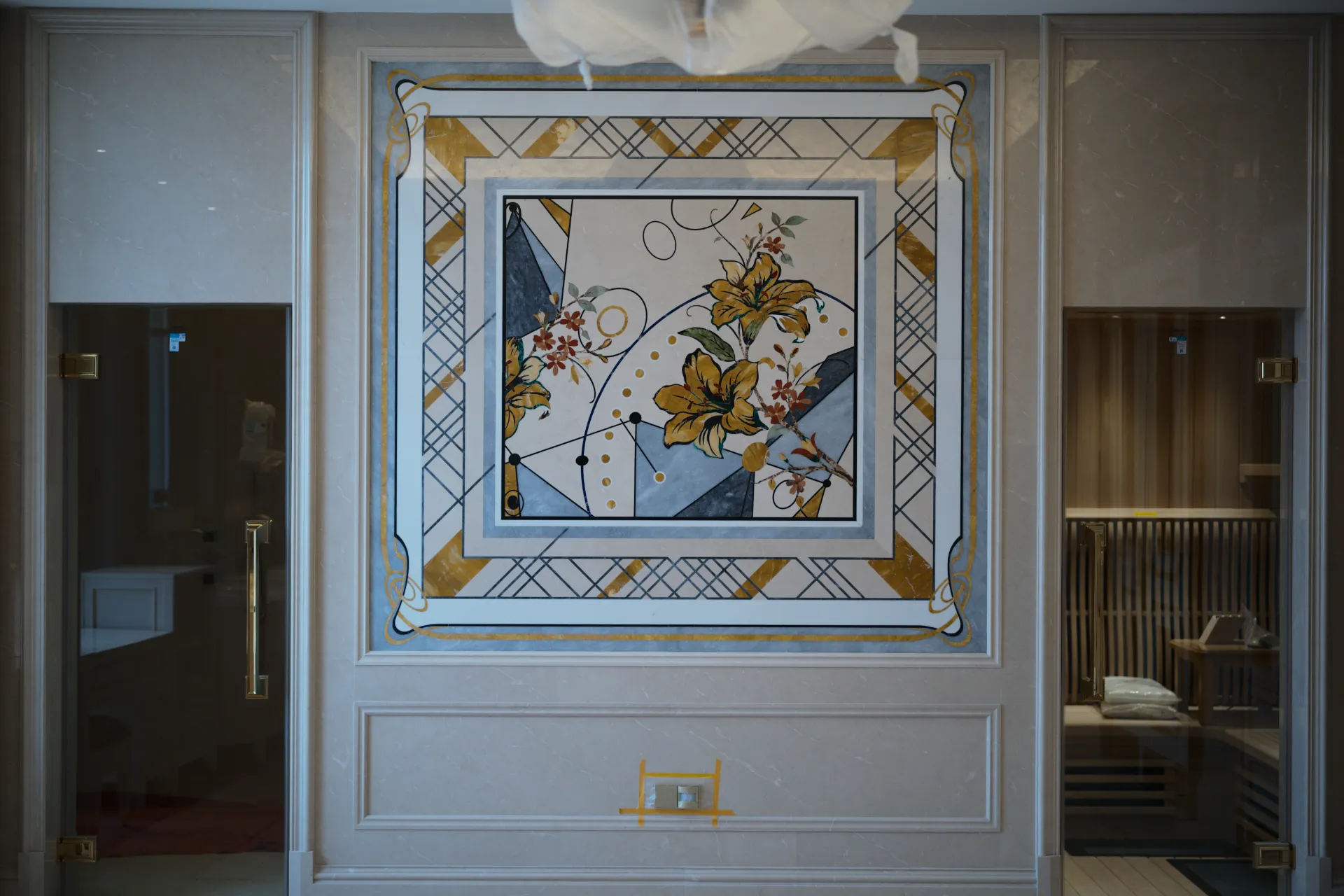 Luxury Wuhan interior featuring custom marble inlay with floral design. Elegant stone craftsmanship and luxury marble flooring detail.