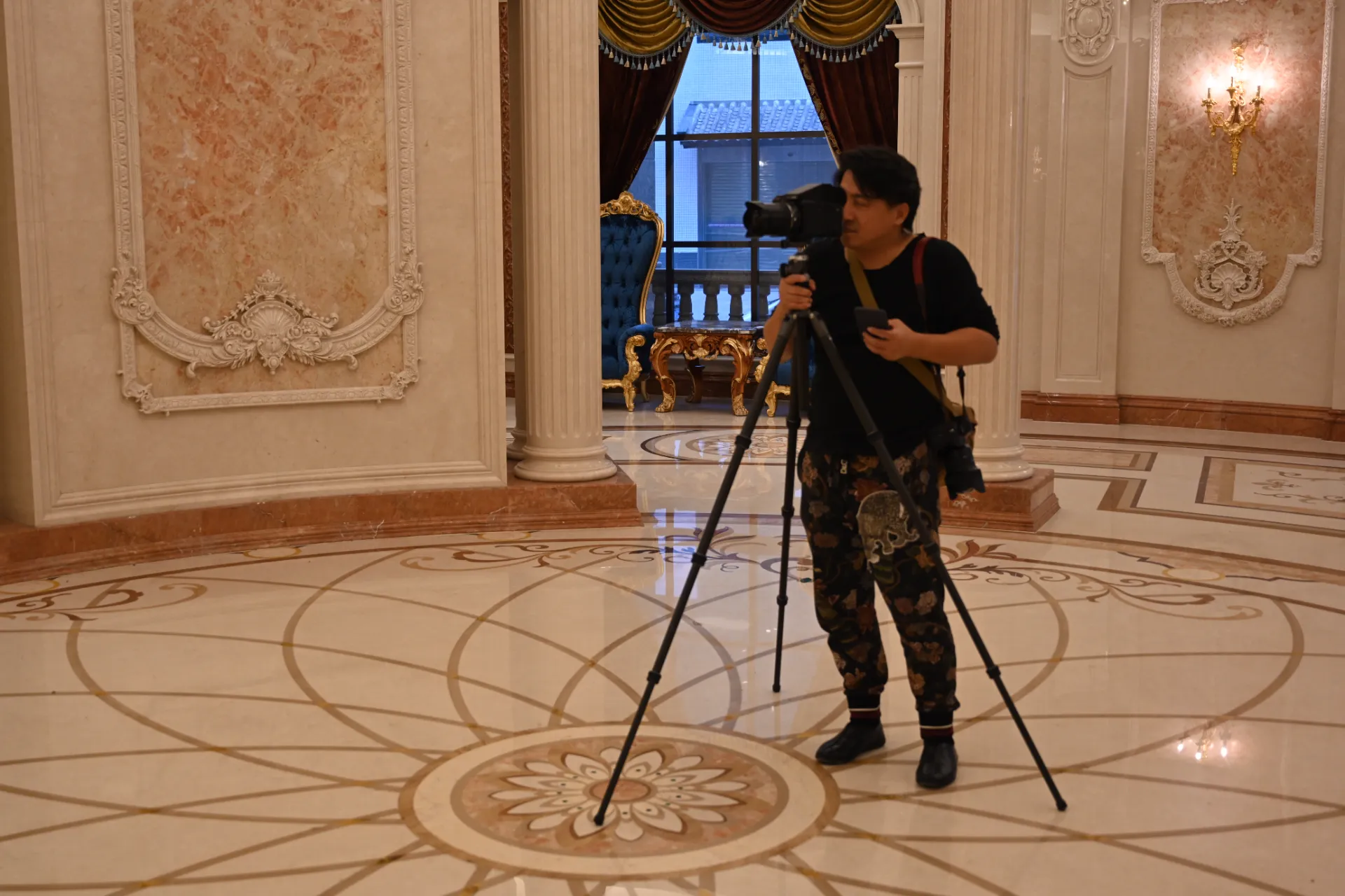 Luxury marble inlay flooring with intricate stone inlay design and a marble floor medallion
