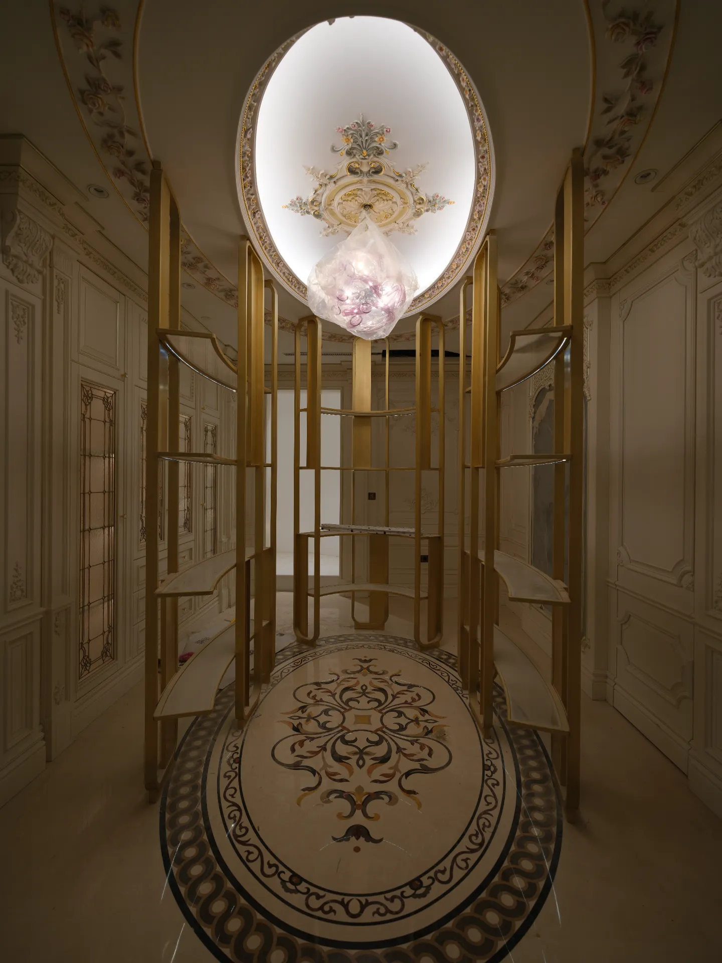 One of eleven pietre dure panels, hand-fitted against Nero Marquina.