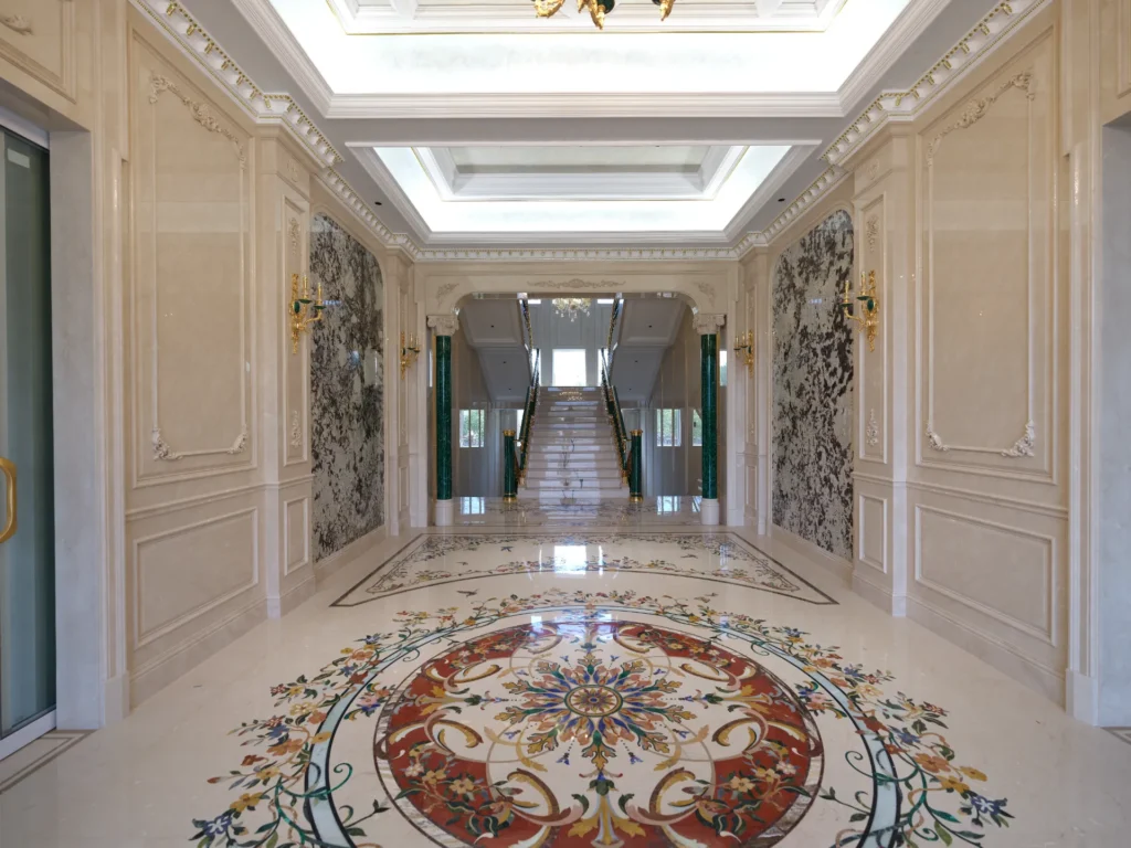Luxury marble floor with circular waterjet inlay medallion in a grand hall