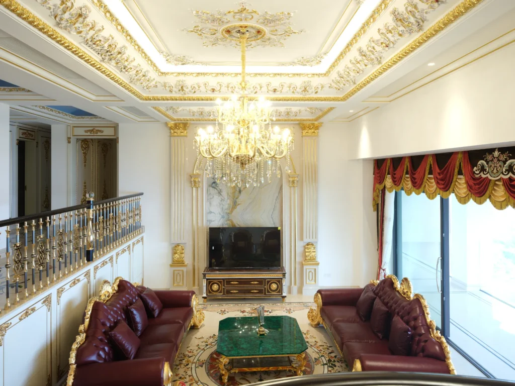 The grand stair hall, floral treads closing on the reception composition.