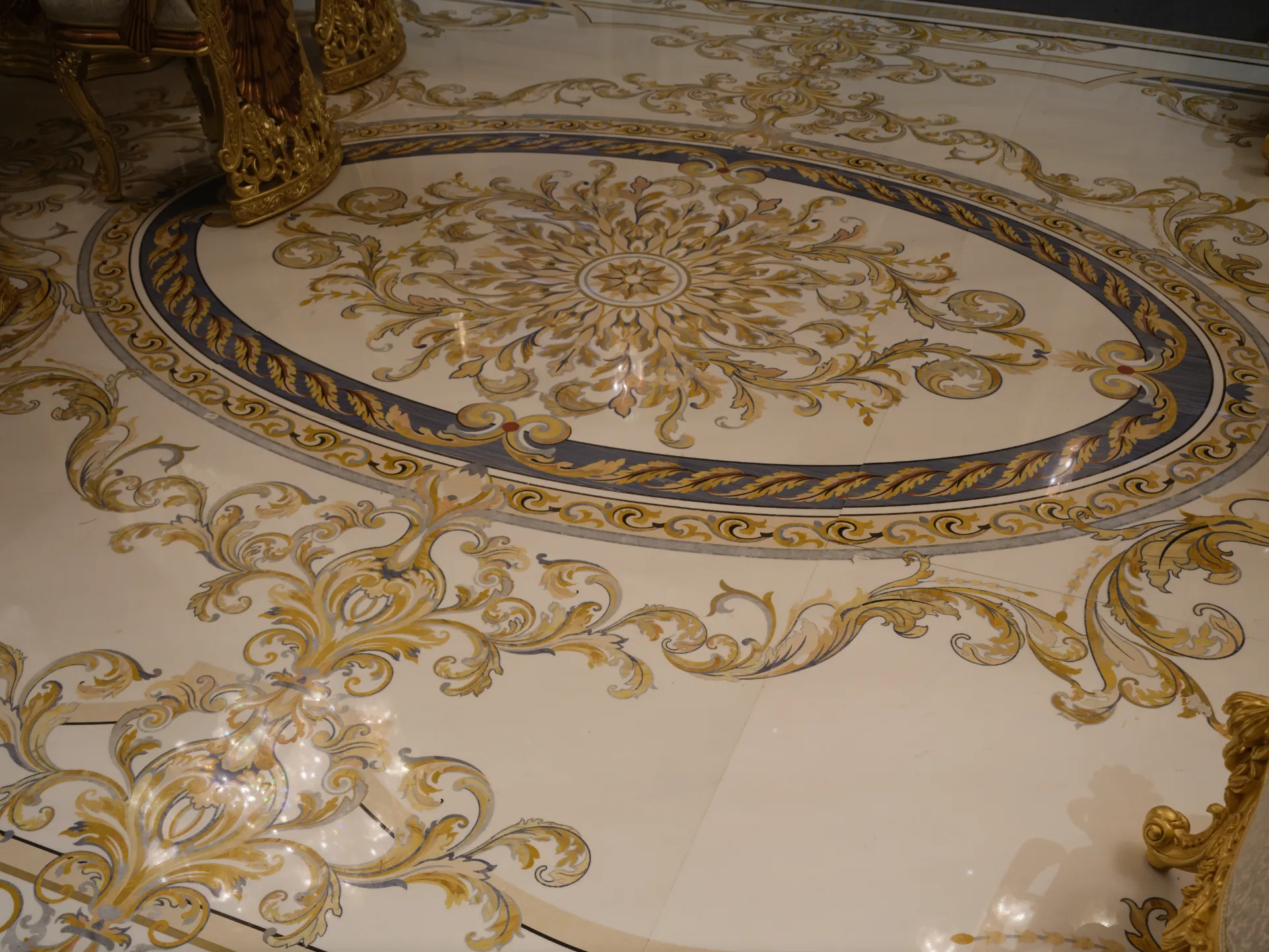 Oval marble floor medallion, set out to the room