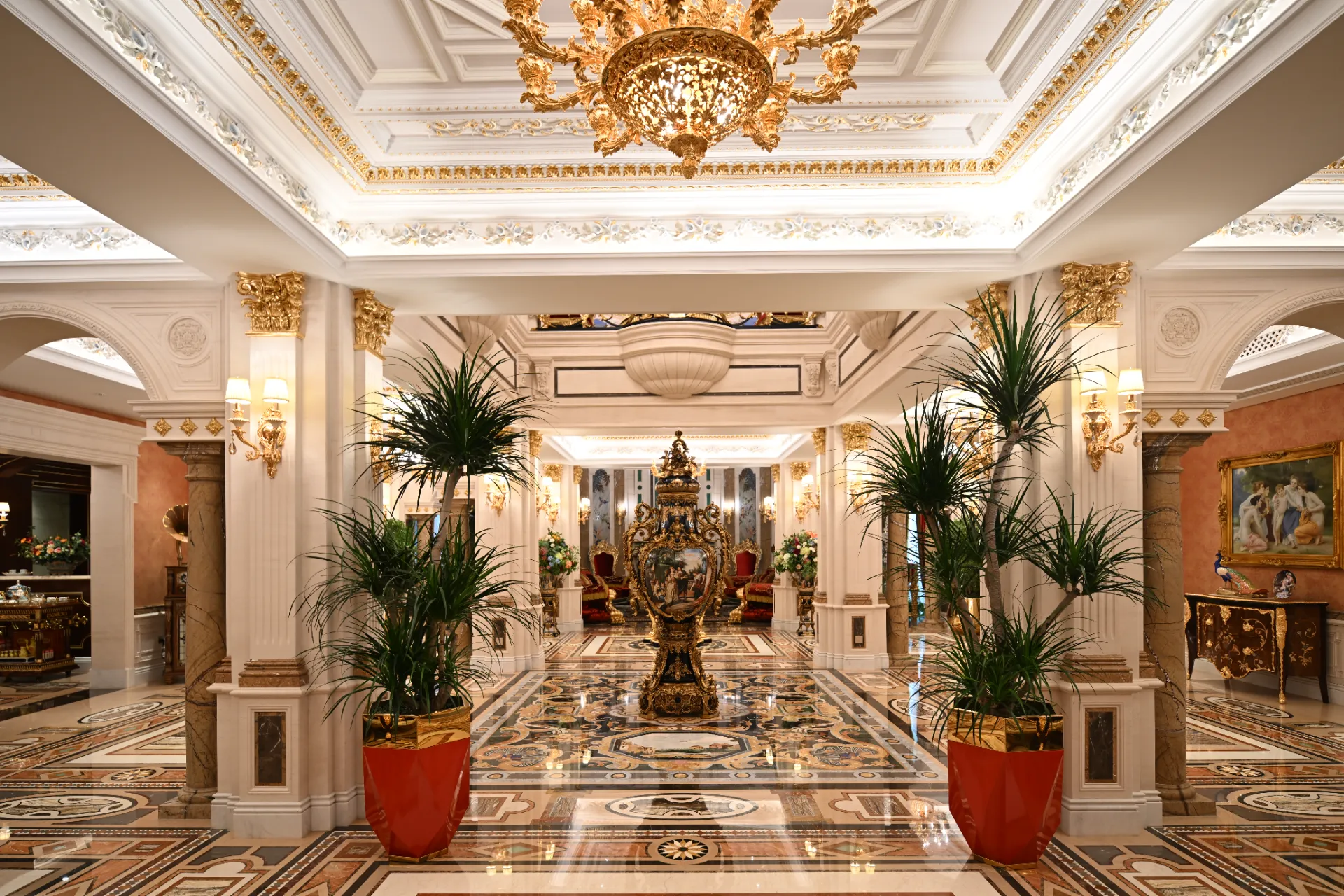 Grand marble inlay reception hall with a gold chandelier, by Art Inlay