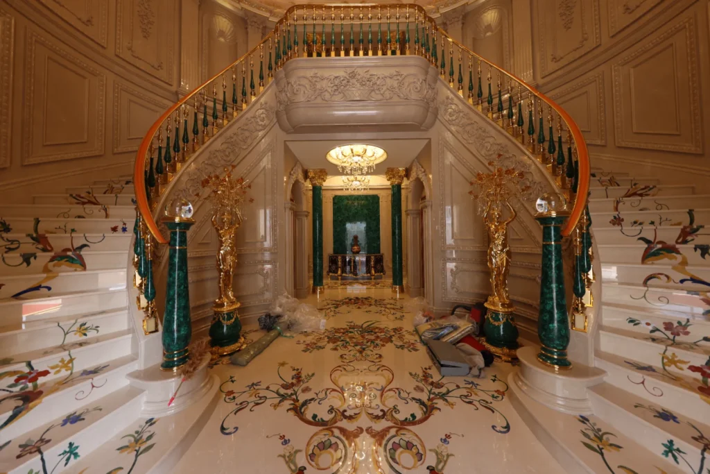 The entrance medallion, dry-fitted against the stair border.