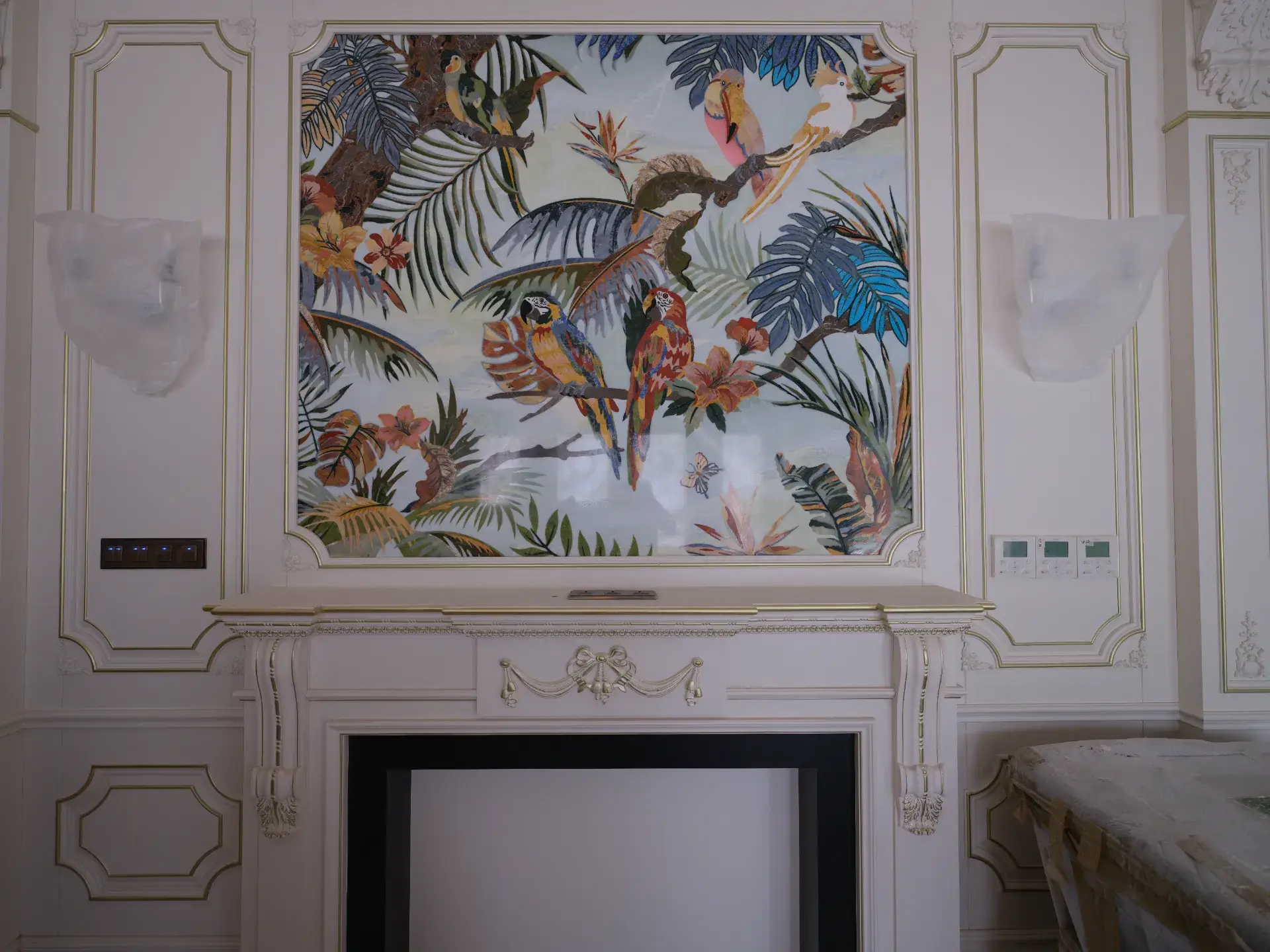 Luxury marble inlay art depicting tropical birds and foliage. Custom stone inlay design with vibrant colors. Marble craftsmanship in Cambodia.