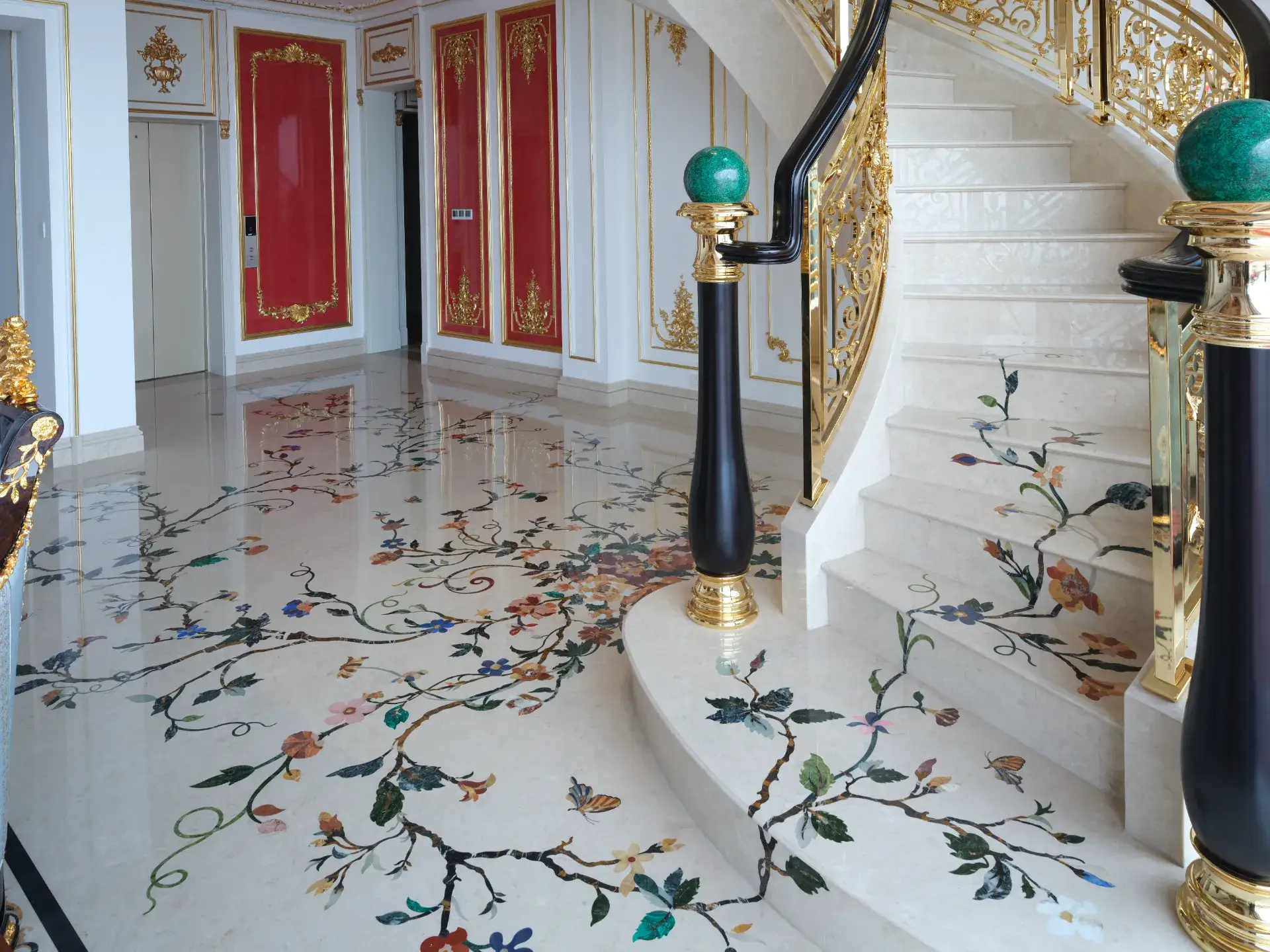 Chongqing luxury marble flooring with a custom marble inlay design. Intricate stone inlay work with floral patterns in this interior.