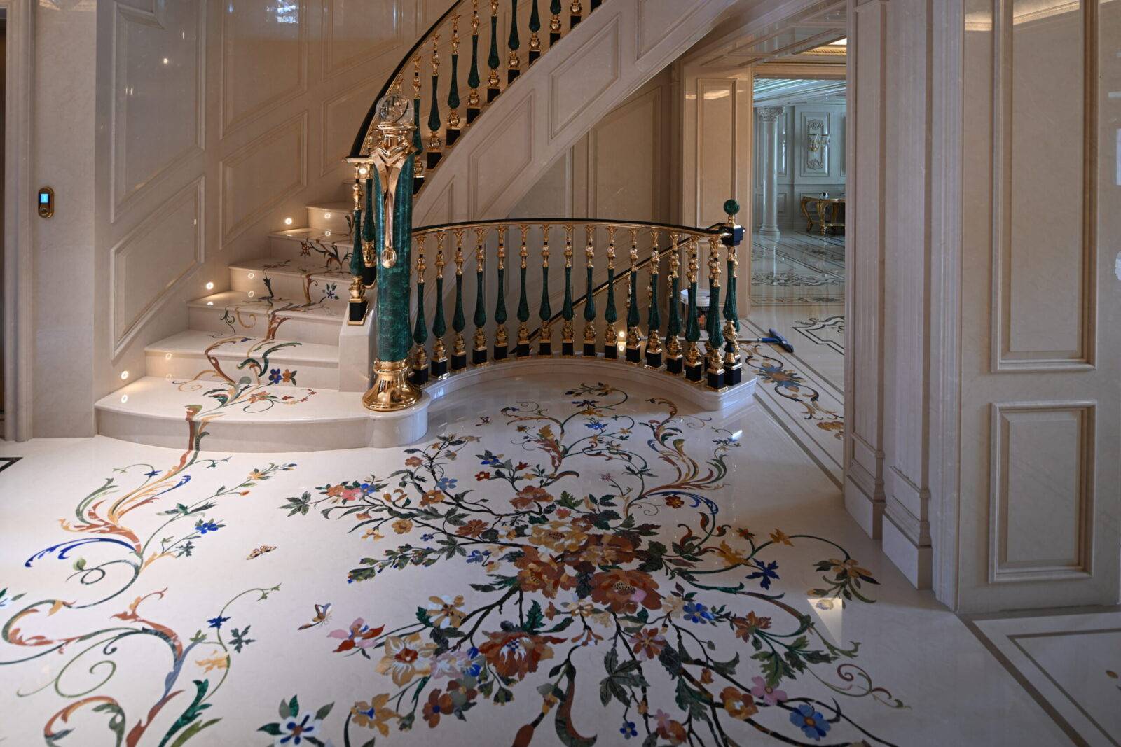 Luxury marble flooring with custom marble inlay floral design. Elegant stone inlay detail in Jiangsu interior.